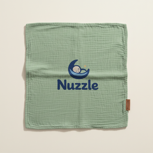 Sage green baby blanket with Nuzzle moon logo